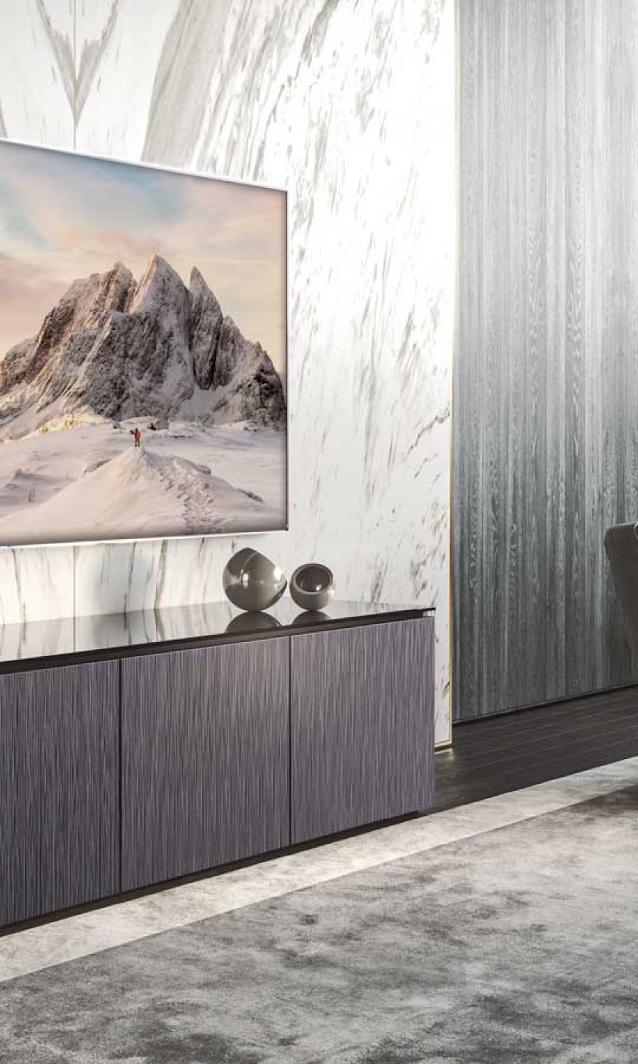 wall-mounted tv on marble with a cabinet beneath