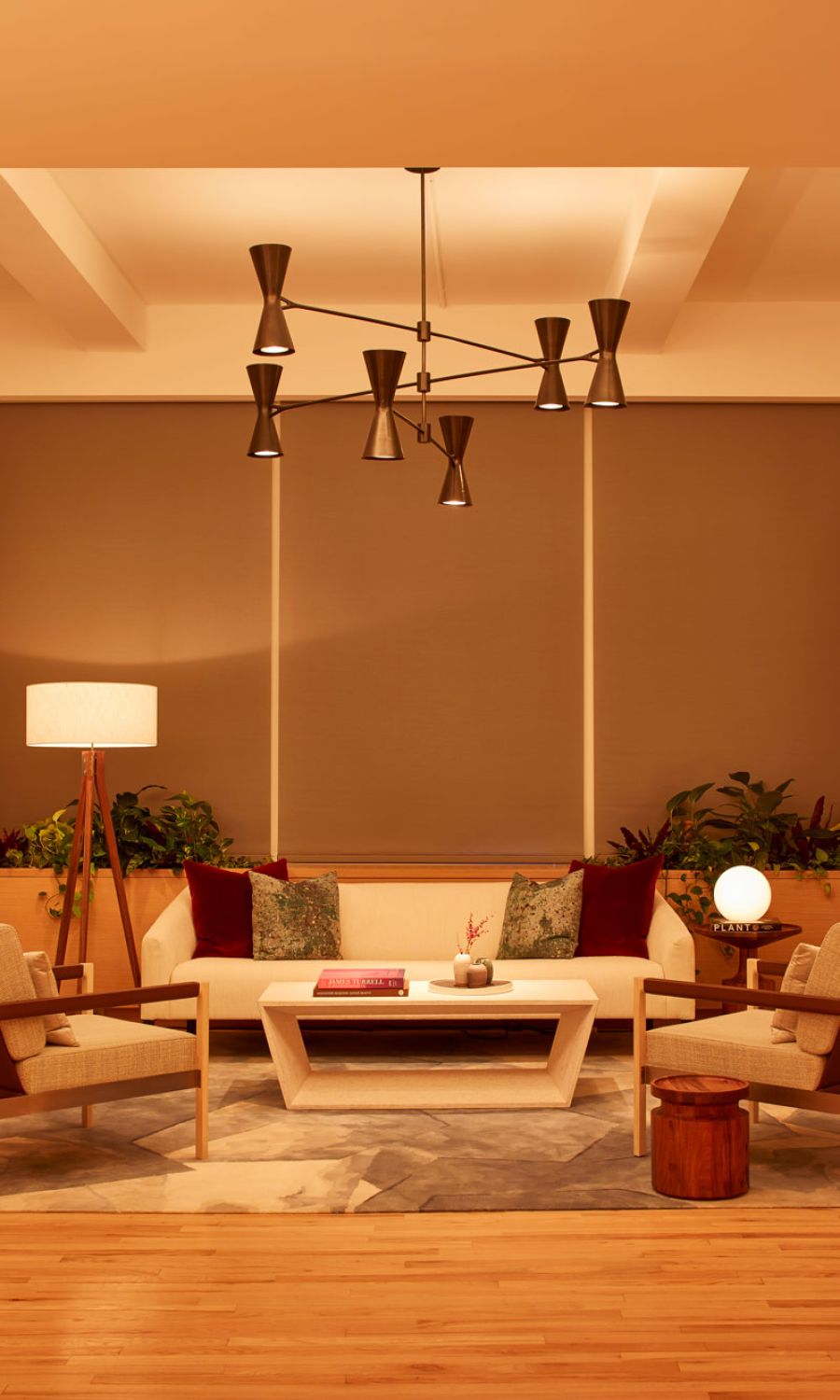 warm toned room with lutron lighting and shades